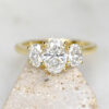 Custom Trilogy Engagement Ring with Yellow Gold Band & Oval Cut Diamond Trilogy