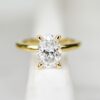 Custom Solitaire Engagement Ring with Yellow Gold Band & Oval Cut Lab Grown Diamond